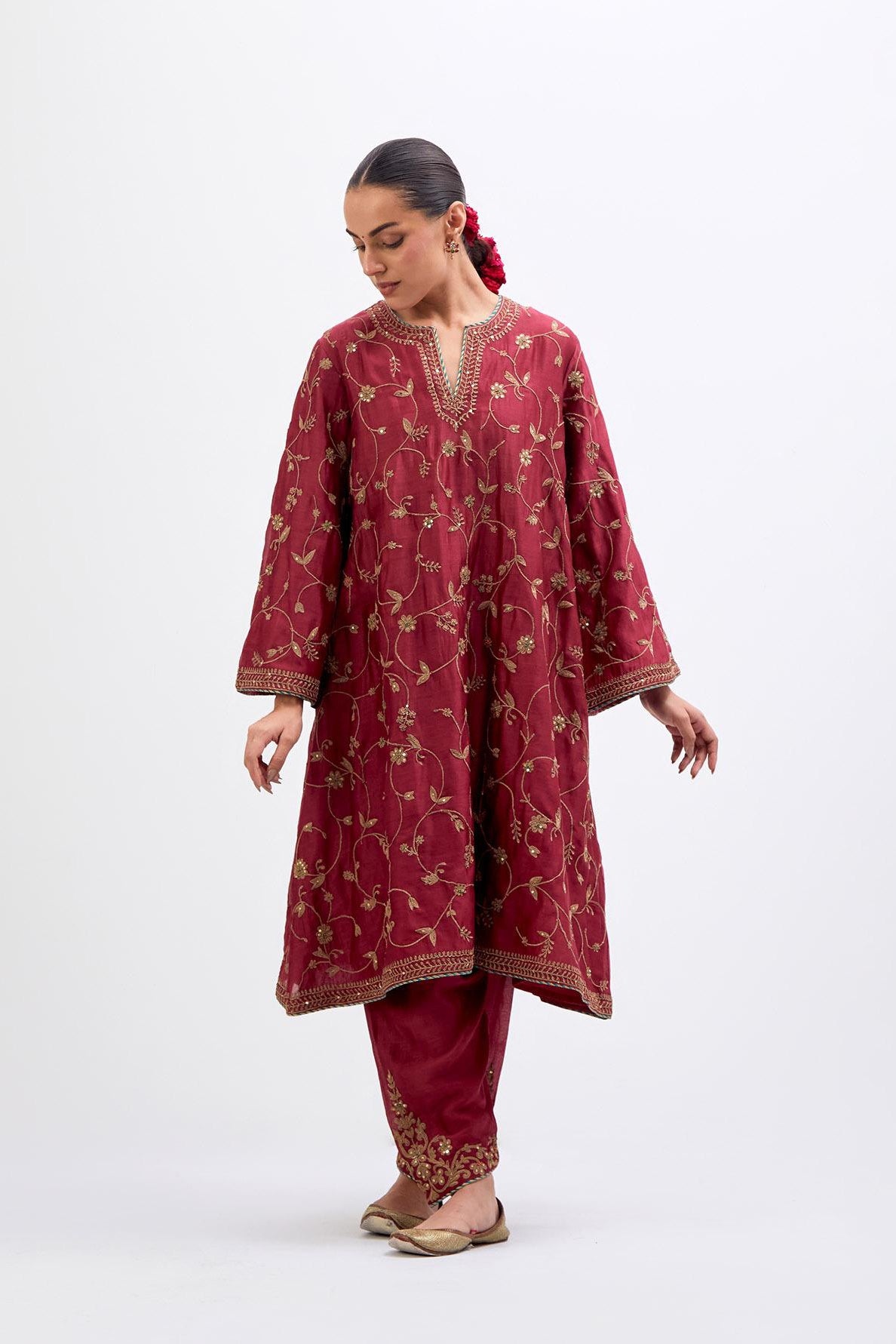 Red Silk Chanderi A-line short kurta set with all-over dull gold dori embroidery, highlighted with multi colored bead and gold sequins work.