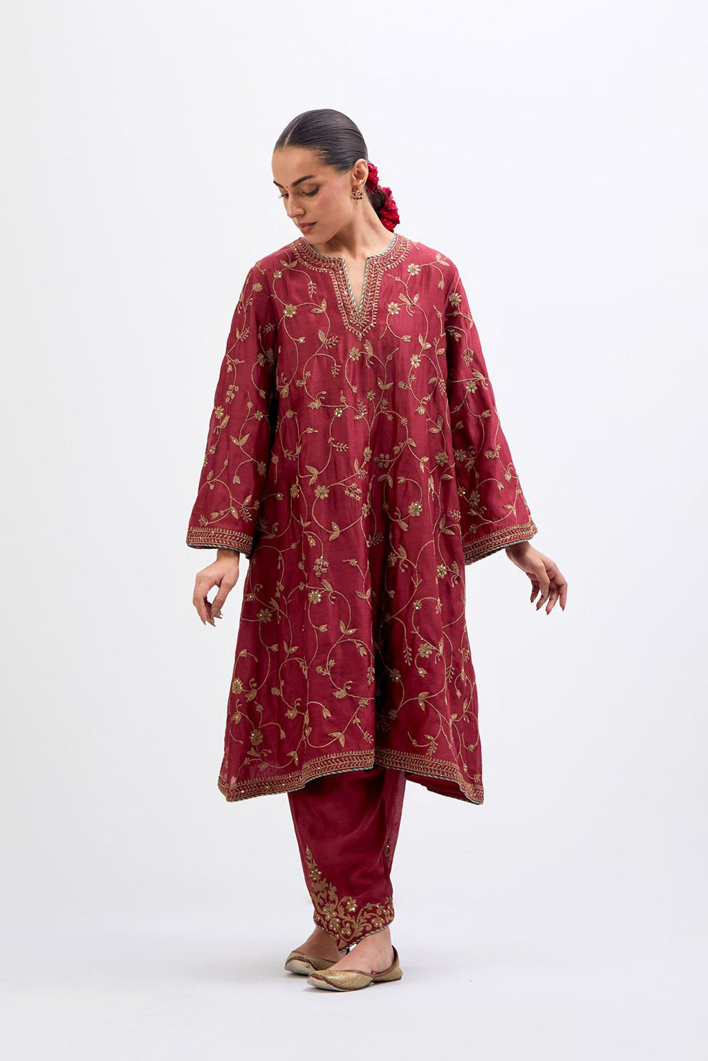 Red Silk Chanderi A-line short kurta set with all-over dull gold dori embroidery, highlighted with multi colored bead and gold sequins work.