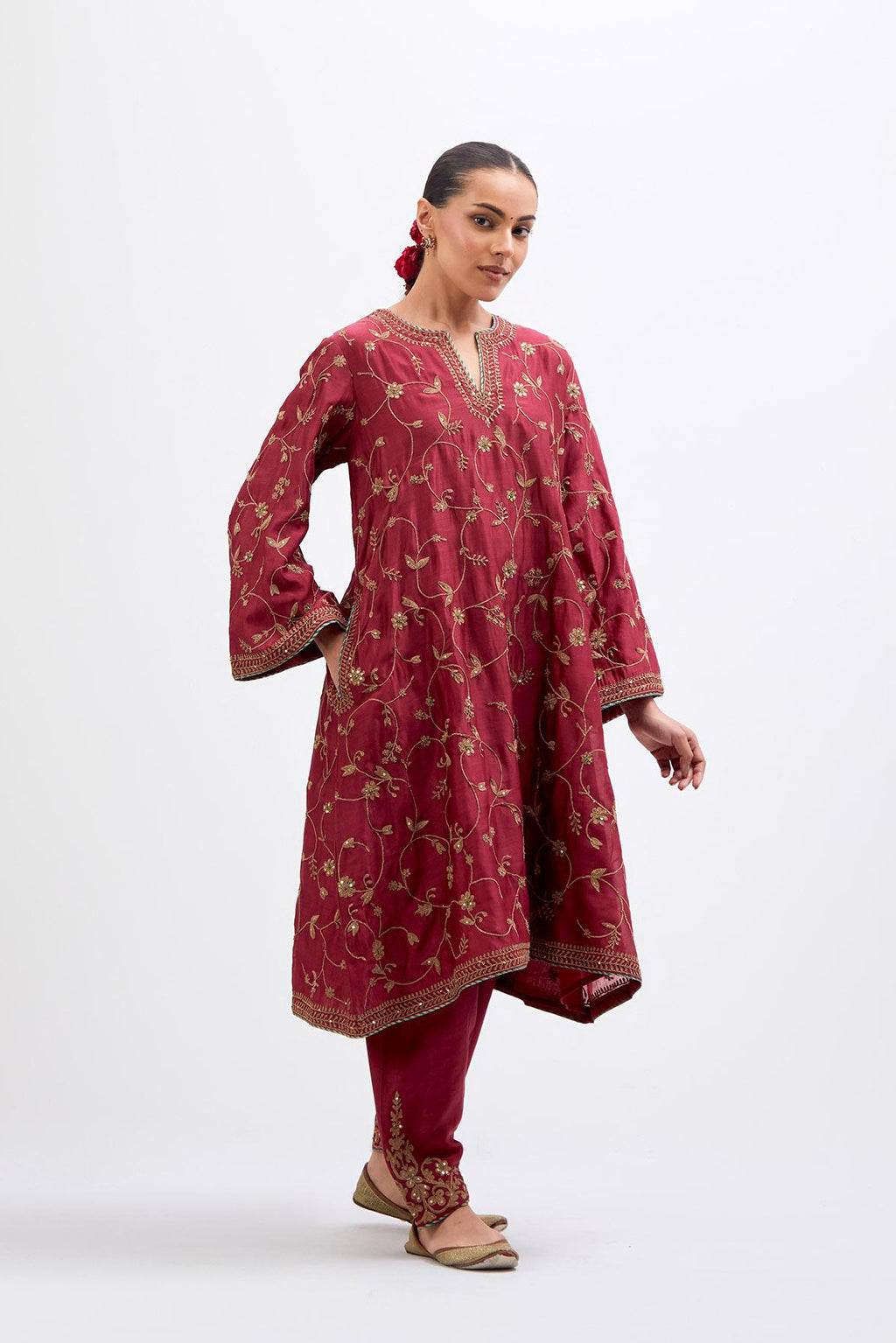 Red Silk Chanderi A-line short kurta set with all-over dull gold dori embroidery, highlighted with multi colored bead and gold sequins work.