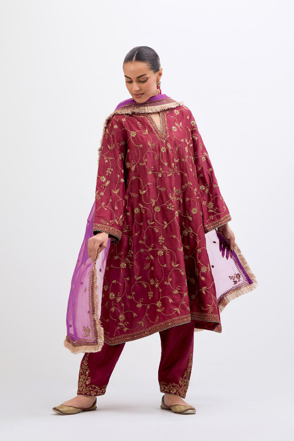 Red Silk Chanderi A-line short kurta set with all-over dull gold dori embroidery, highlighted with multi colored bead and gold sequins work.