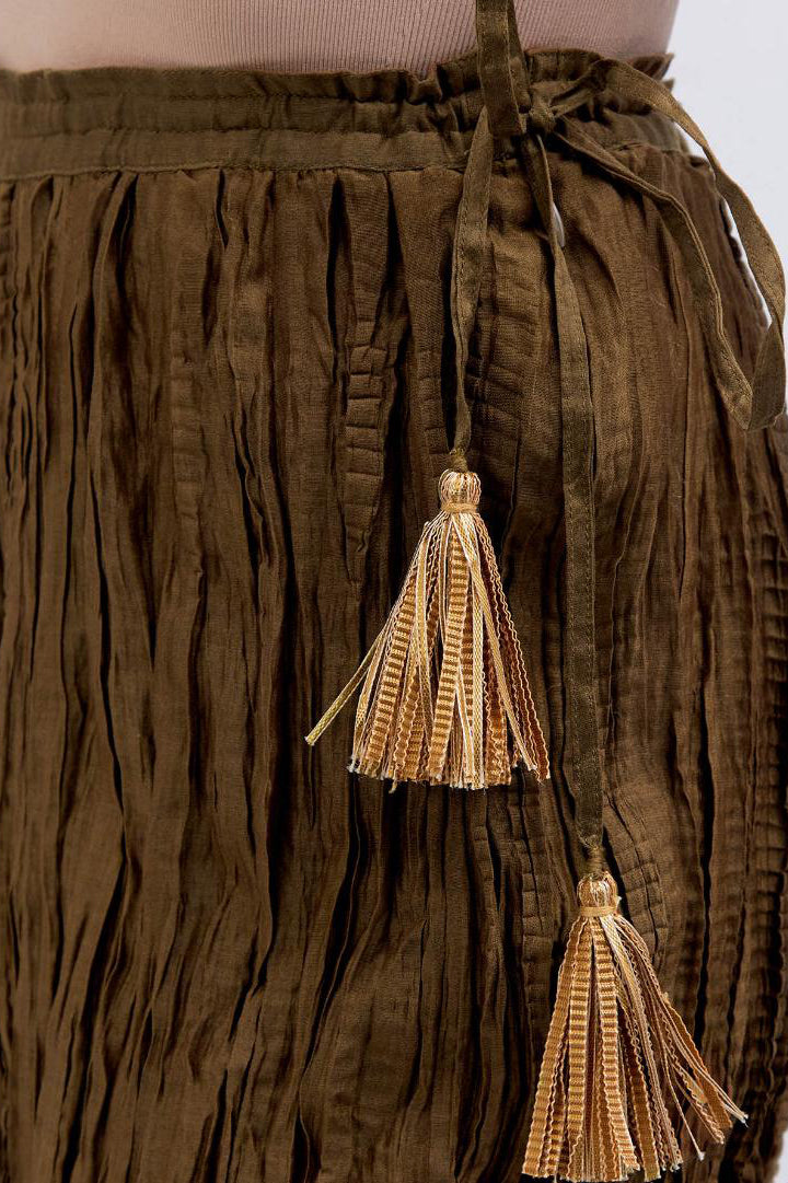 Olive Silk Chanderi crushed sharara, highlighted with dull gold gota border.