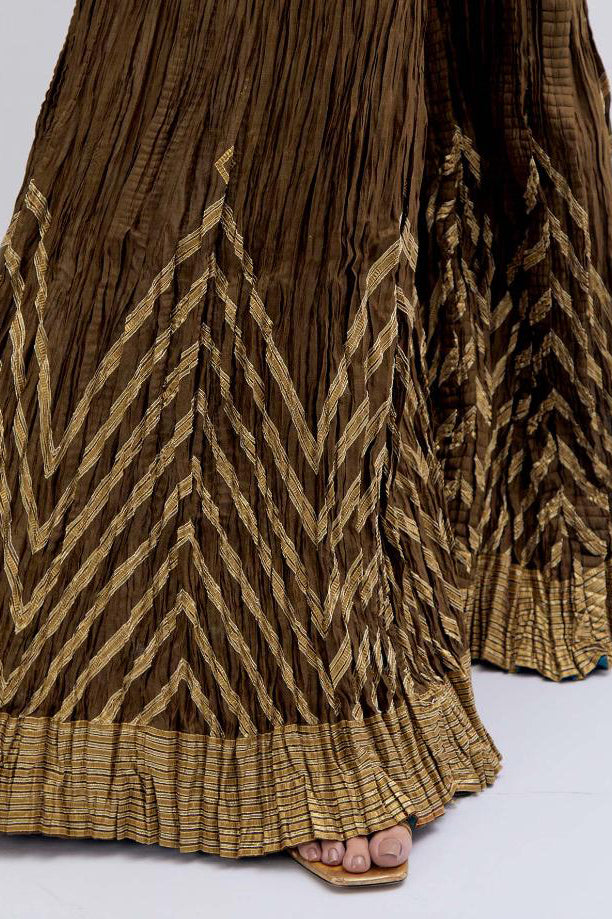 Olive Silk Chanderi crushed sharara, highlighted with dull gold gota border.