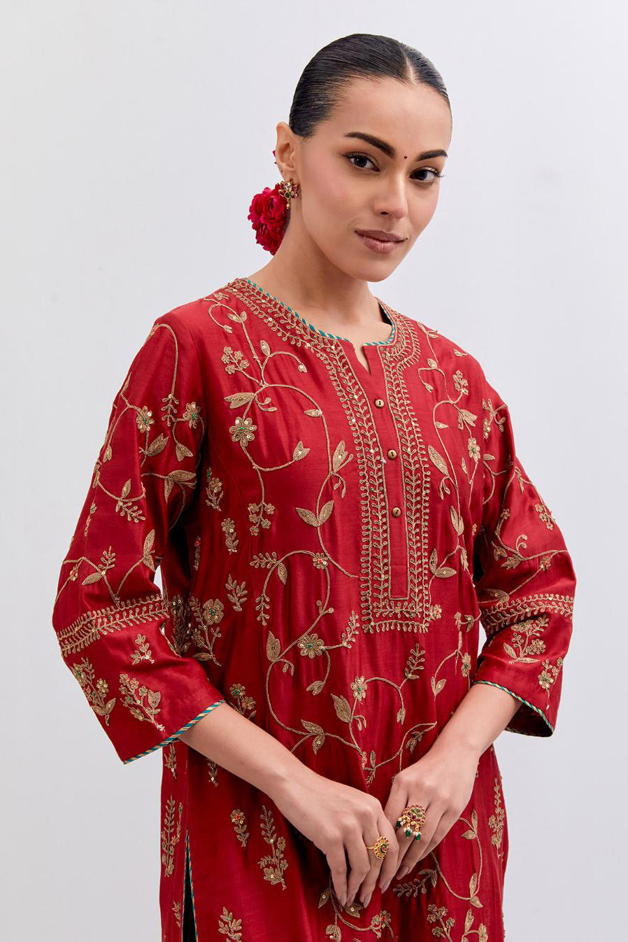Red Silk Chanderi kurta set with all-over dull gold dori jaal embroidery and small floral booti at side panels.
