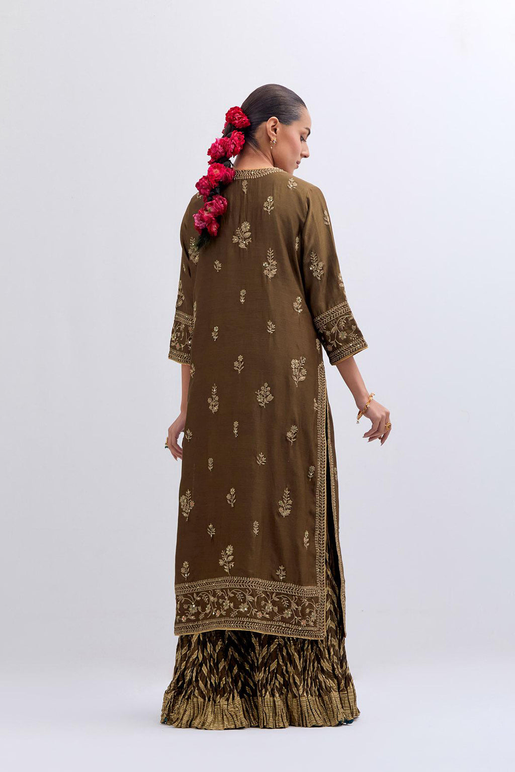 Olive Silk Chanderi straight kurta set with dull gold dori embroidery at front & back neck, sleeves, side slits and hem, highlighted with gold sequins and bead work.