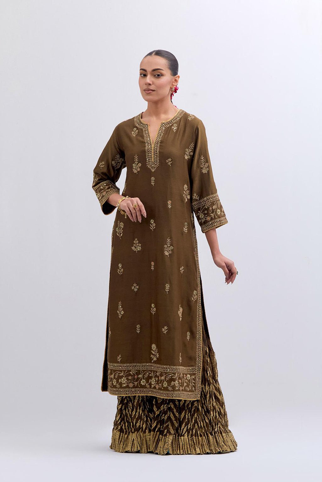 Olive Silk Chanderi straight kurta set with dull gold dori embroidery at front & back neck, sleeves, side slits and hem, highlighted with gold sequins and bead work.