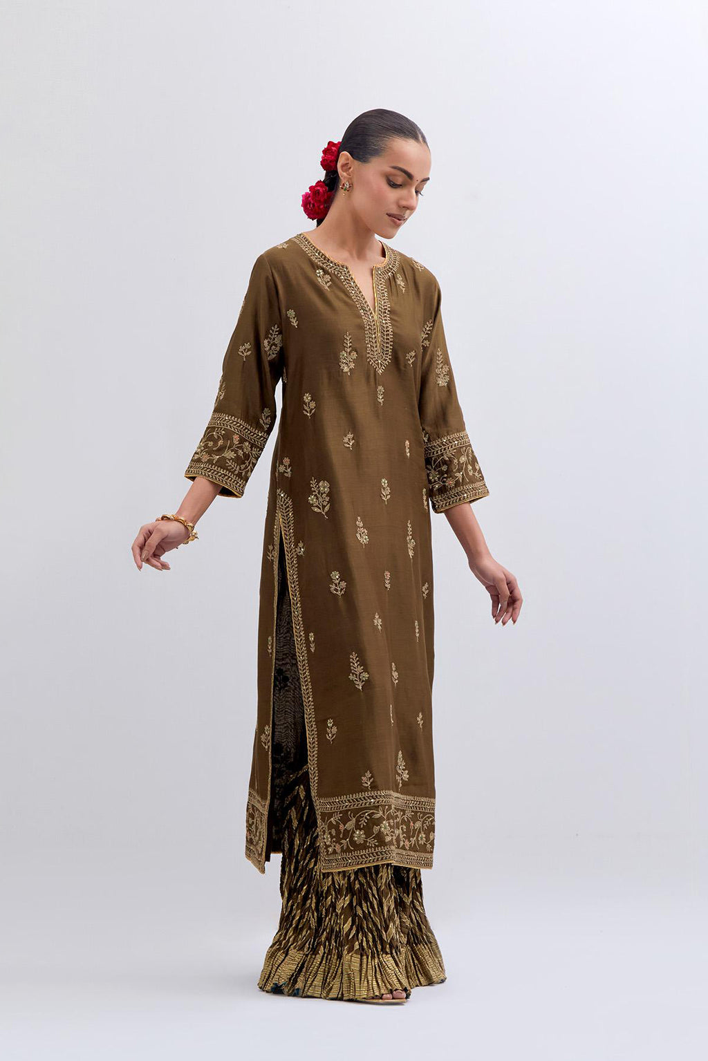 Olive Silk Chanderi straight kurta set with dull gold dori embroidery at front & back neck, sleeves, side slits and hem, highlighted with gold sequins and bead work.