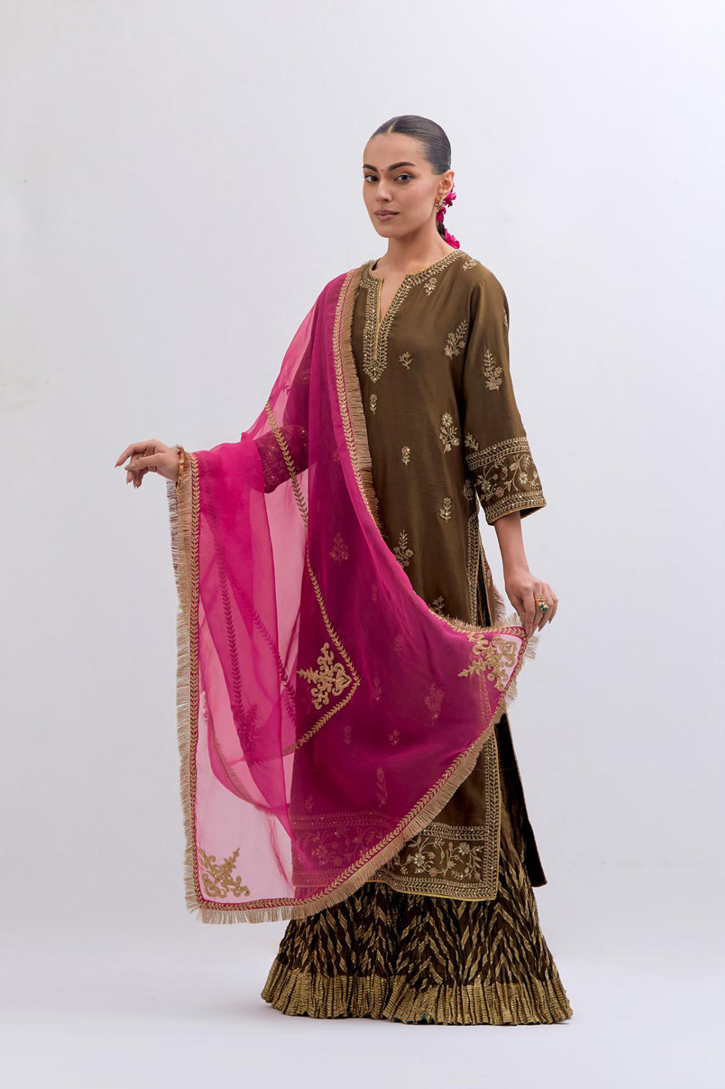 Olive Silk Chanderi straight kurta set with dull gold dori embroidery at front & back neck, sleeves, side slits and hem, highlighted with gold sequins and bead work.