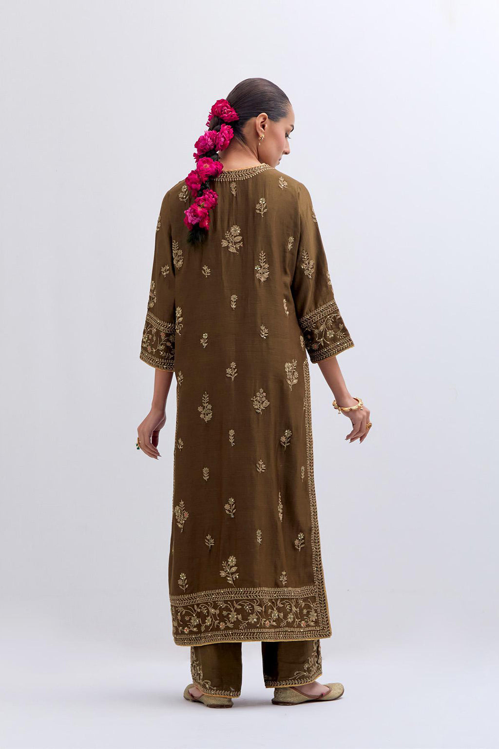 Olive Silk Chanderi straight kurta set with dull gold dori embroidery at front & back neck, sleeves, side slits and hem, highlighted with gold sequins and bead work.