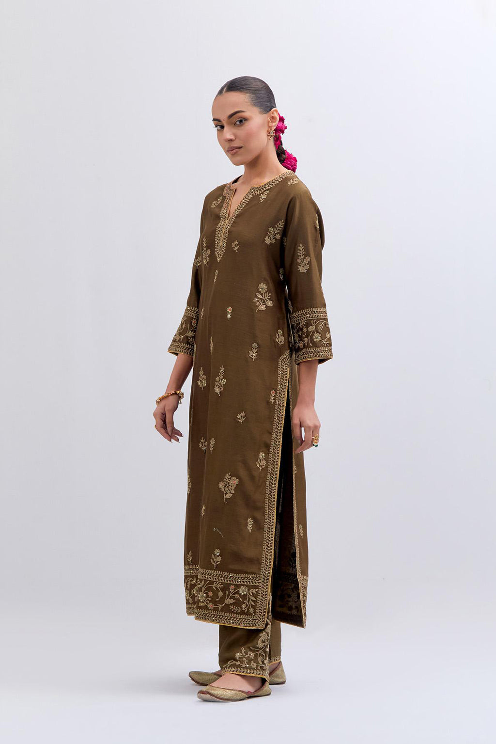 Olive Silk Chanderi straight kurta set with dull gold dori embroidery at front & back neck, sleeves, side slits and hem, highlighted with gold sequins and bead work.