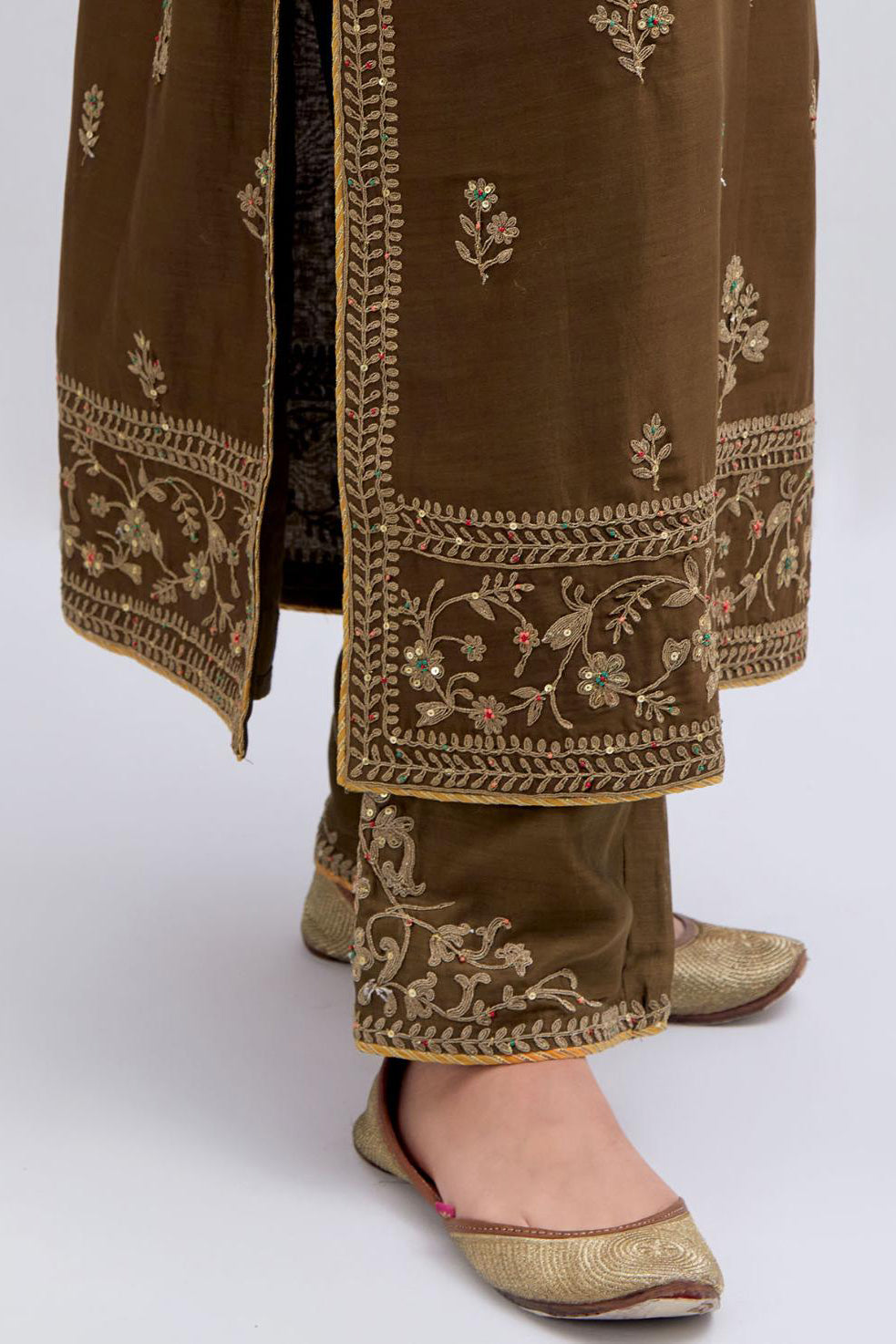 Olive Silk Chanderi straight kurta set with dull gold dori embroidery at front & back neck, sleeves, side slits and hem, highlighted with gold sequins and bead work.