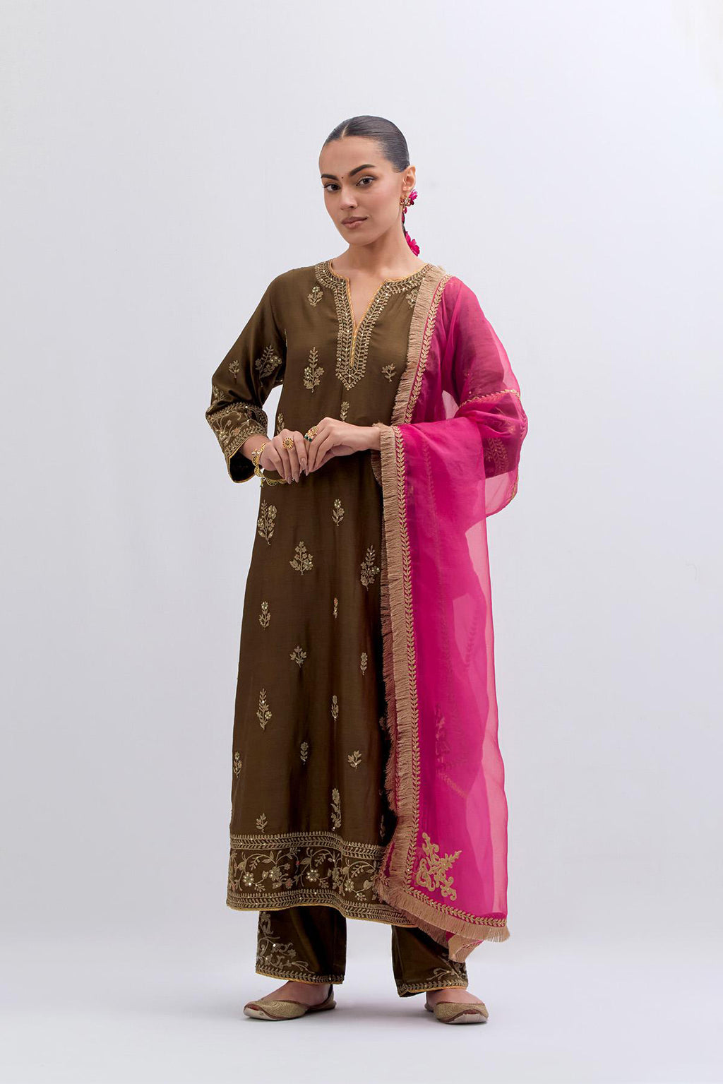 Olive Silk Chanderi straight kurta set with dull gold dori embroidery at front & back neck, sleeves, side slits and hem, highlighted with gold sequins and bead work.