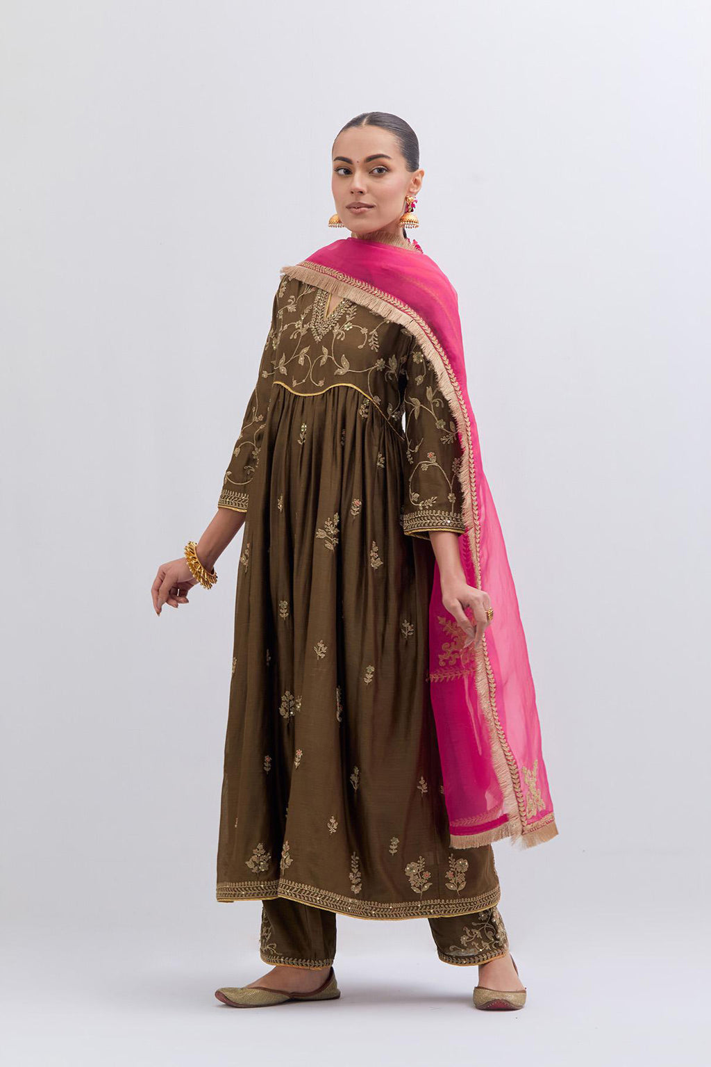 Olive Silk Chanderi long kurta dress set with all-over dull gold dori embroidery, highlighted with gold sequins and bead work.