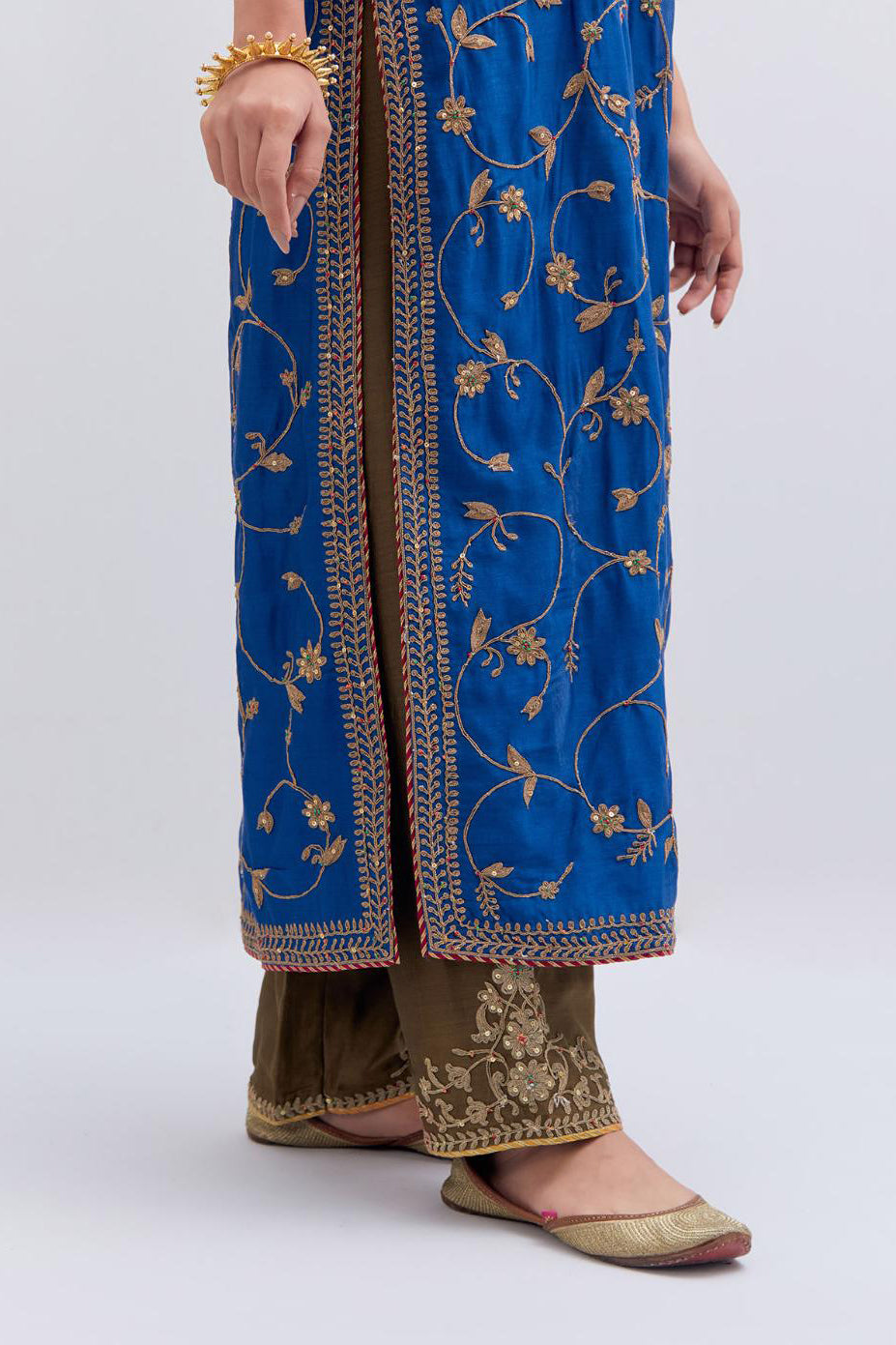 Chelsea Blue Silk chanderi straight kurta set with all-over dull gold dori jaal embroidery, highlighted with gold sequins and bead work.