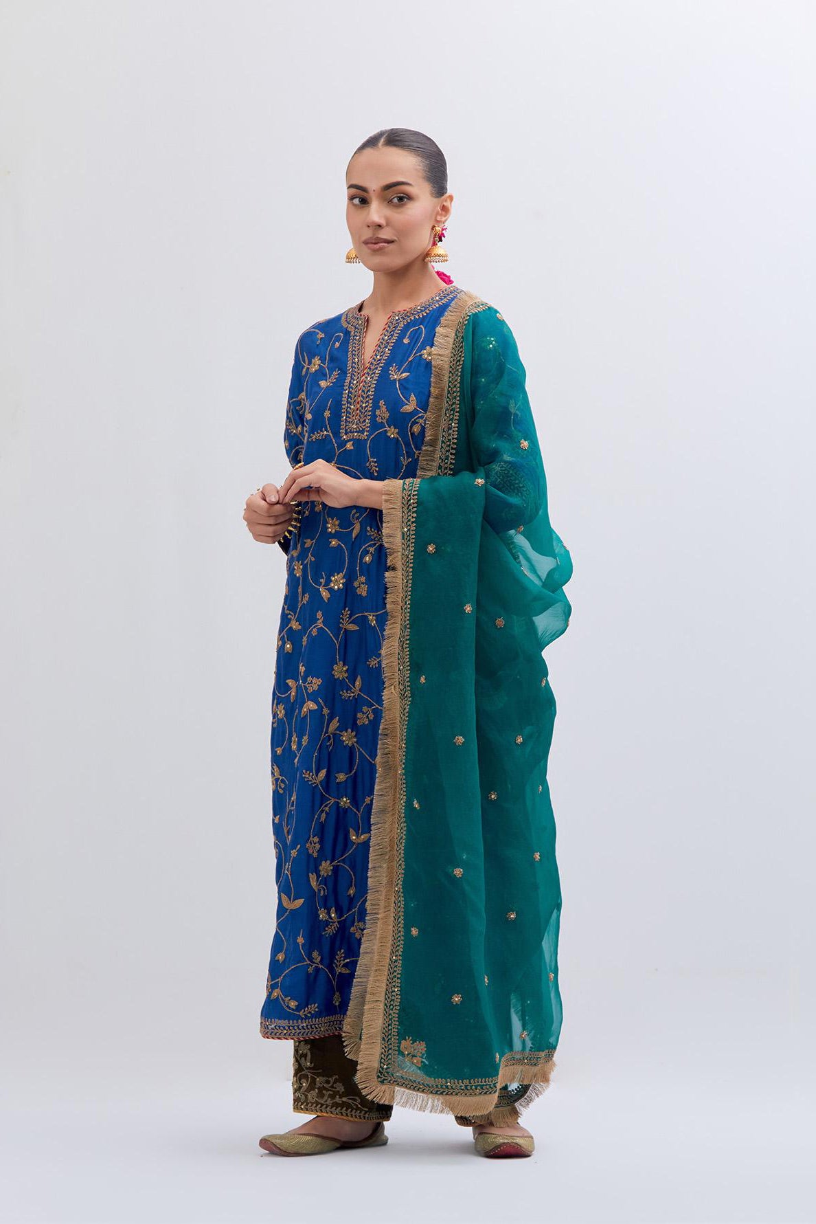 Teal Green Silk Organza dupatta detailed with all-over dull gold dori small floral booti embroidery, highlighted with multi colored beads and gold sequins work.