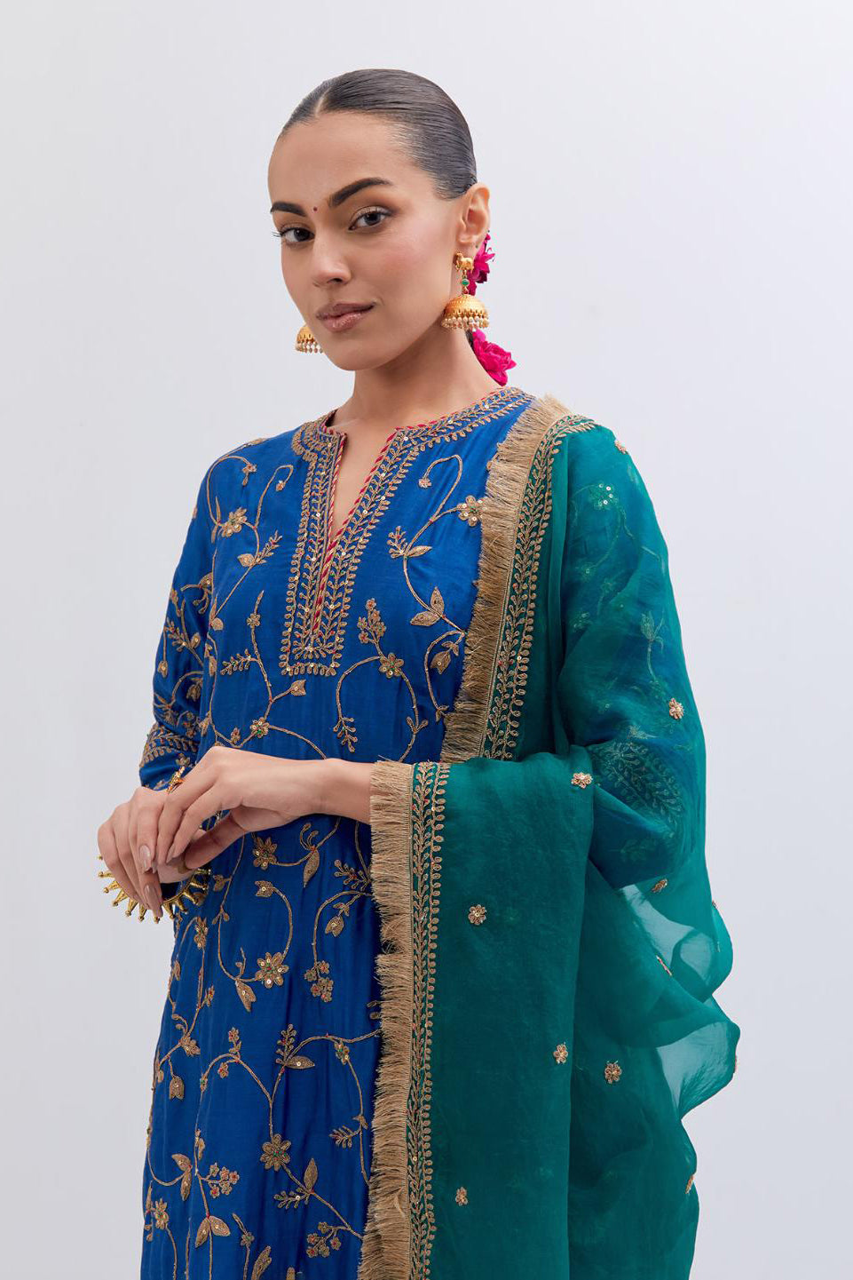 Teal Green Silk Organza dupatta detailed with all-over dull gold dori small floral booti embroidery, highlighted with multi colored beads and gold sequins work.
