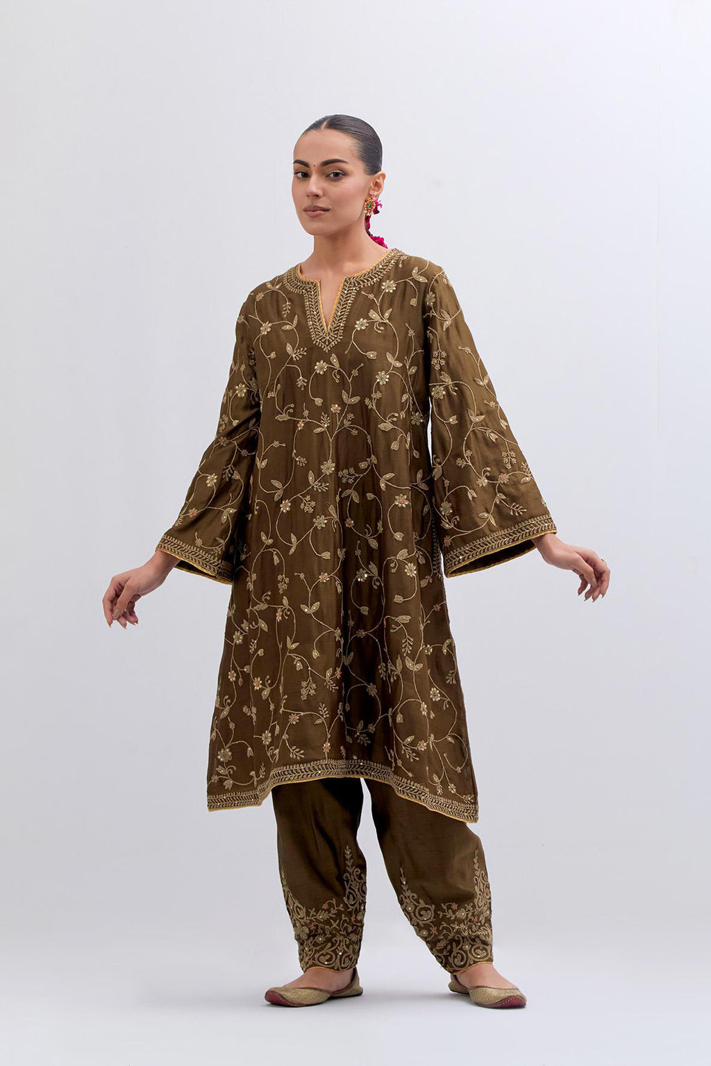 Olive Silk Chanderi A-line short kurta set with all-over dull gold dori embroidery, highlighted with multi colored bead and gold sequins work.
