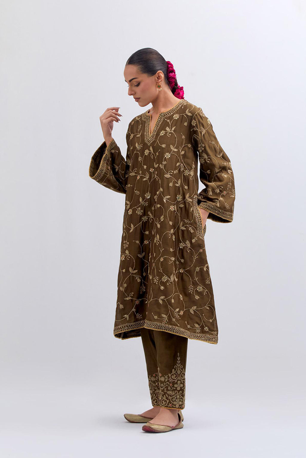 Olive Silk Chanderi A-line short kurta set with all-over dull gold dori embroidery, highlighted with multi colored bead and gold sequins work.