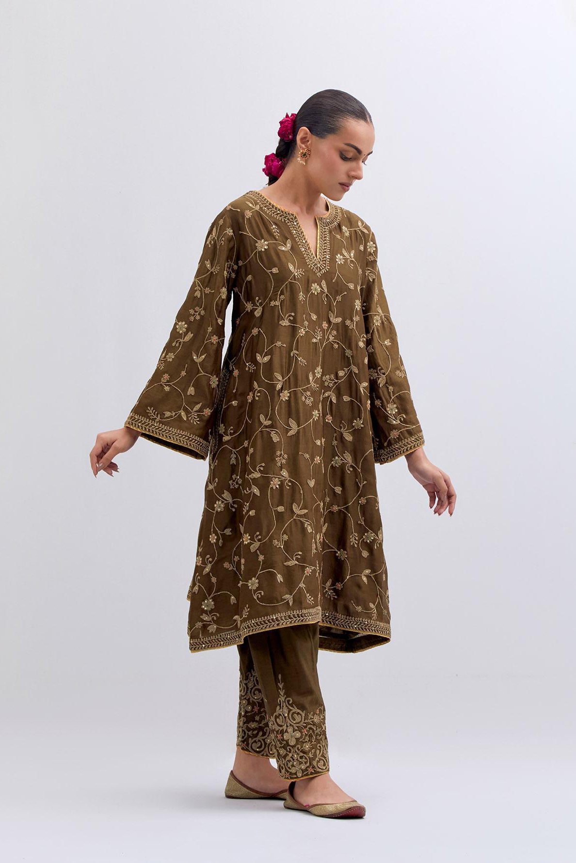 Olive Silk Chanderi A-line short kurta set with all-over dull gold dori embroidery, highlighted with multi colored bead and gold sequins work.