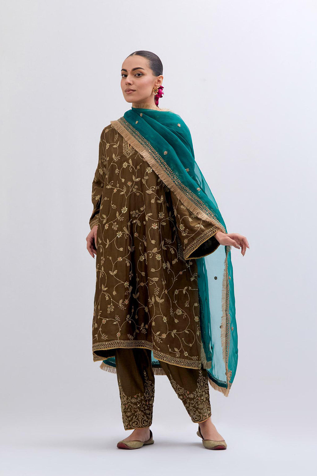 Olive Silk Chanderi A-line short kurta set with all-over dull gold dori embroidery, highlighted with multi colored bead and gold sequins work.