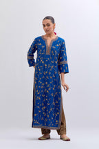 Chelsea Blue Silk chanderi straight kurta set with all-over dull gold dori jaal embroidery, highlighted with gold sequins and bead work.