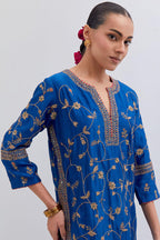 Chelsea Blue Silk chanderi straight kurta set with all-over dull gold dori jaal embroidery, highlighted with gold sequins and bead work.