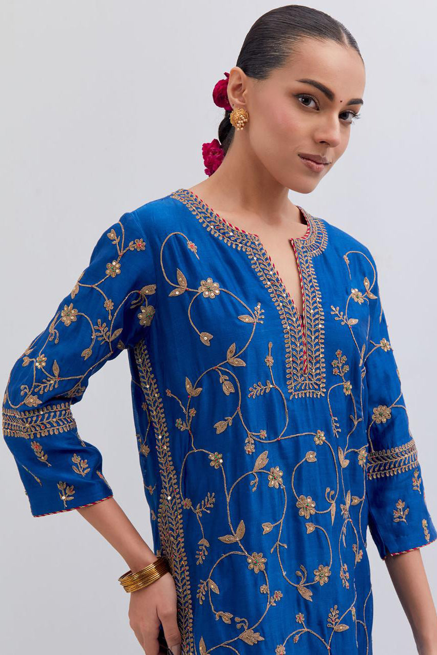 Chelsea Blue Silk chanderi straight kurta set with all-over dull gold dori jaal embroidery, highlighted with gold sequins and bead work.