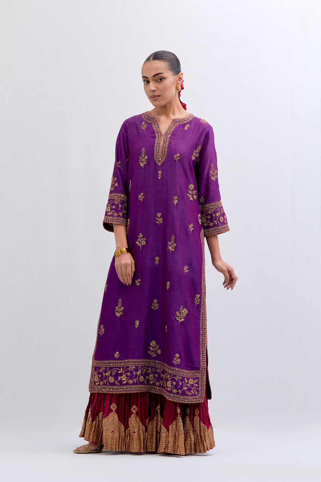 Purple Silk Chanderi straight kurta set with dull gold dori embroidery at front & back neck, sleeves, side slits and hem, highlighted with gold sequins and bead work.