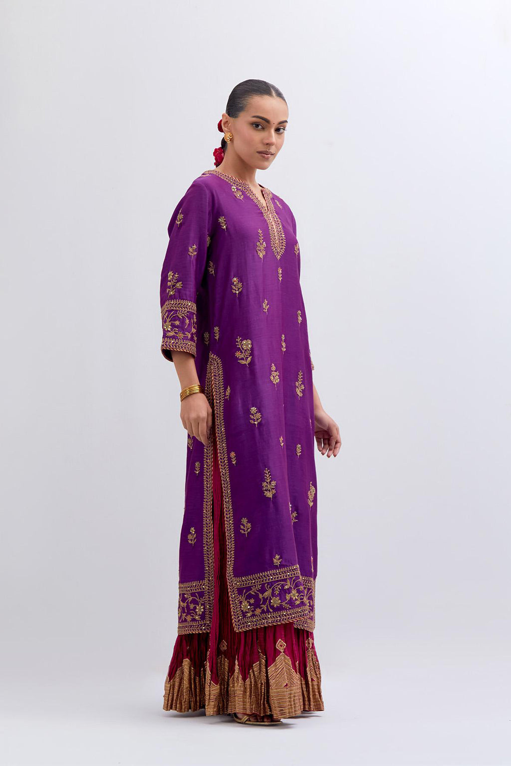 Purple Silk Chanderi straight kurta set with dull gold dori embroidery at front & back neck, sleeves, side slits and hem, highlighted with gold sequins and bead work.
