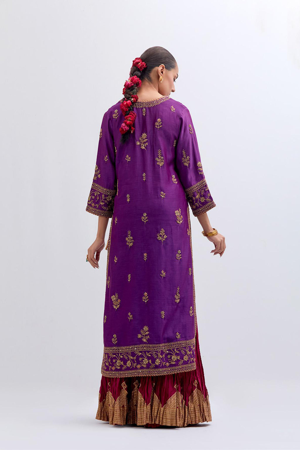 Purple Silk Chanderi straight kurta set with dull gold dori embroidery at front & back neck, sleeves, side slits and hem, highlighted with gold sequins and bead work.