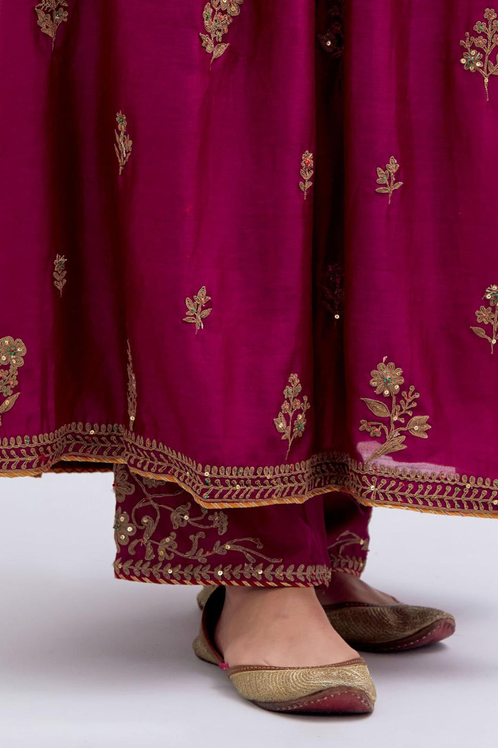 Deep Fuchsia Silk Chanderi long kurta dress set with all-over dull gold dori embroidery, highlighted with gold sequins and bead work.