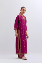Fuchsia Silk Chanderi straight kurta set with narrow border dull gold dori embroidery at front & back neck, sleeves, side slits and hem, highlighted with gold sequins and bead work.