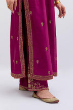 Fuchsia Silk Chanderi straight kurta set with narrow border dull gold dori embroidery at front & back neck, sleeves, side slits and hem, highlighted with gold sequins and bead work.