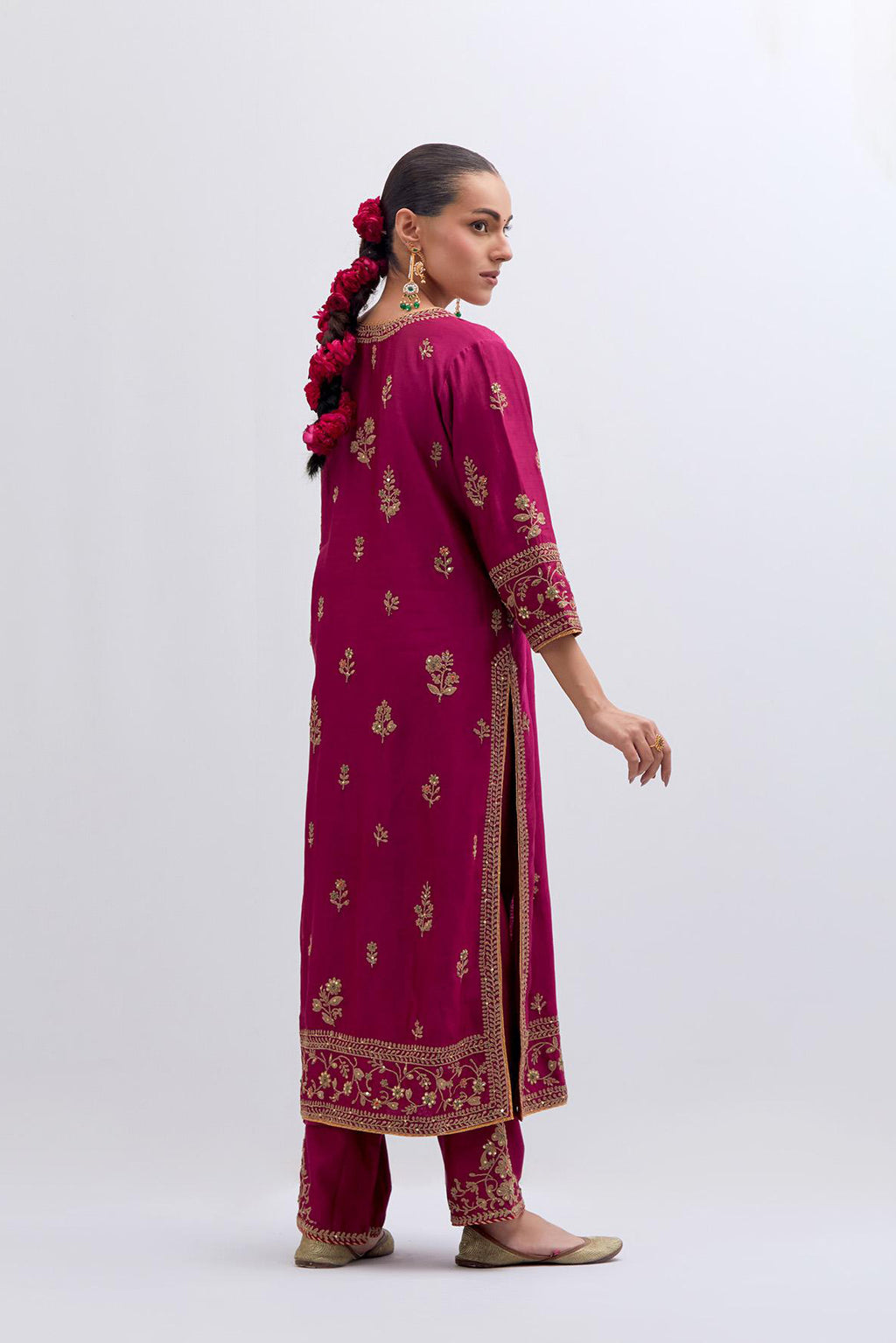 Fuchsia Silk Chanderi straight kurta set with dull gold dori embroidery at front & back neck, sleeves, side slits and hem, highlighted with gold sequins and bead work.