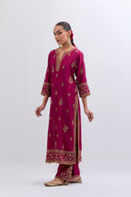 Fuchsia Silk Chanderi straight kurta set with dull gold dori embroidery at front & back neck, sleeves, side slits and hem, highlighted with gold sequins and bead work.