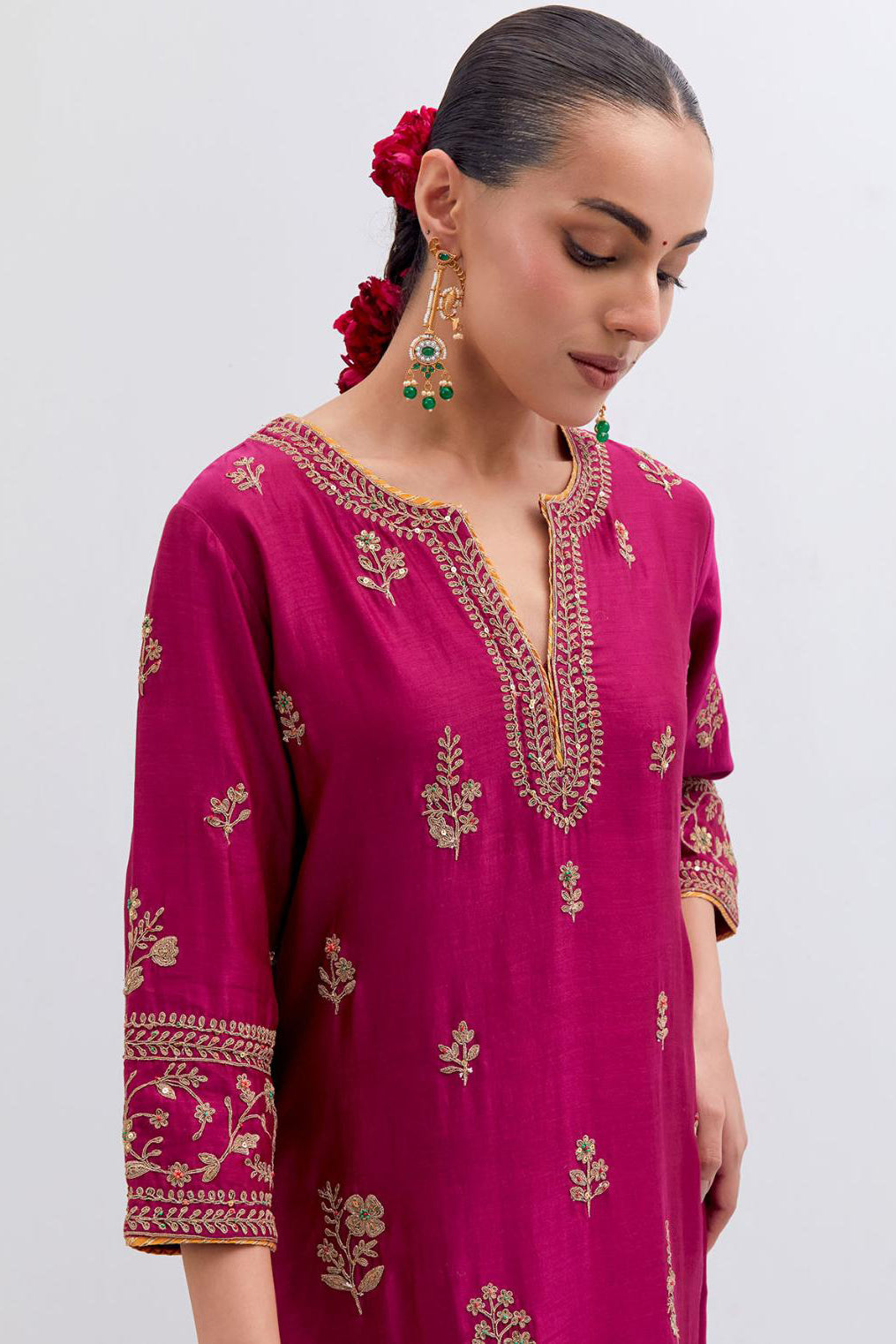 Fuchsia Silk Chanderi straight kurta set with dull gold dori embroidery at front & back neck, sleeves, side slits and hem, highlighted with gold sequins and bead work.