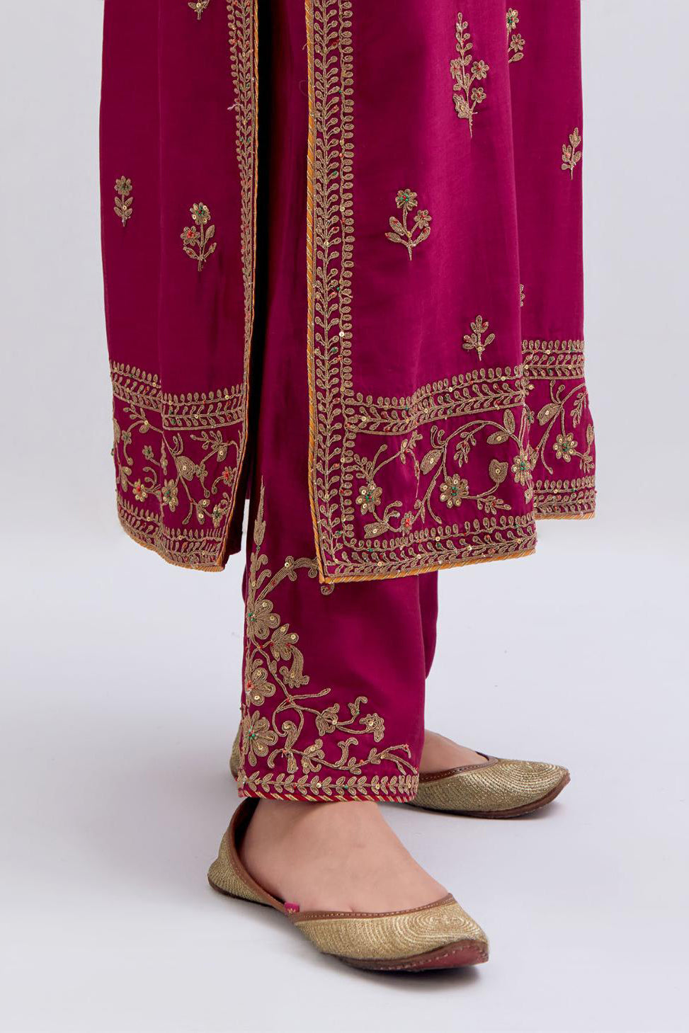 Fuchsia Silk Chanderi straight kurta set with dull gold dori embroidery at front & back neck, sleeves, side slits and hem, highlighted with gold sequins and bead work.