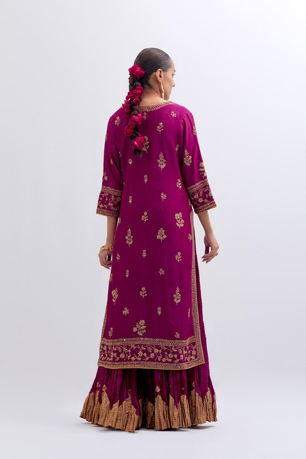 Fuchsia Silk Chanderi straight kurta set with dull gold dori embroidery at front & back neck, sleeves, side slits and hem, highlighted with gold sequins and bead work.