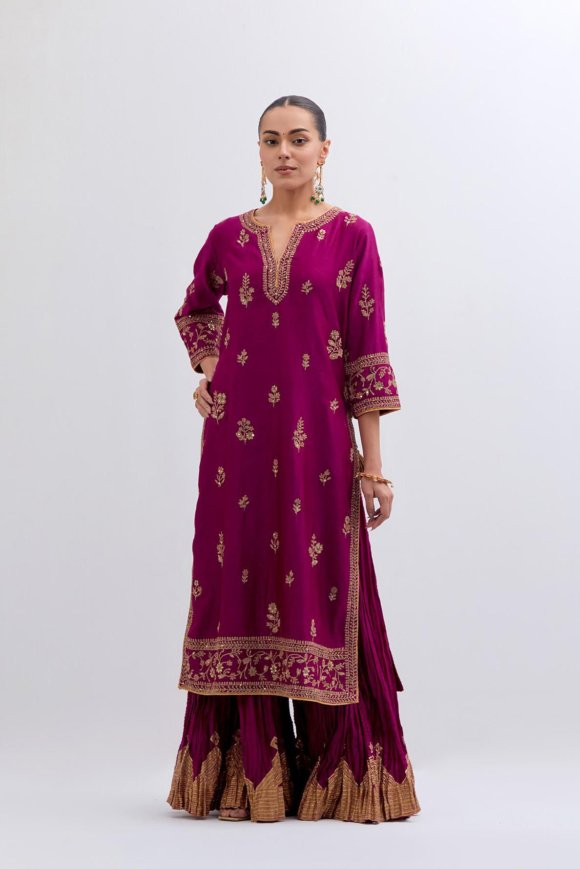 Fuchsia Silk Chanderi straight kurta set with dull gold dori embroidery at front & back neck, sleeves, side slits and hem, highlighted with gold sequins and bead work.