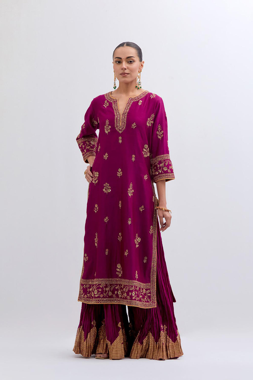 Fuchsia Silk Chanderi straight kurta set with dull gold dori embroidery at front & back neck, sleeves, side slits and hem, highlighted with gold sequins and bead work.