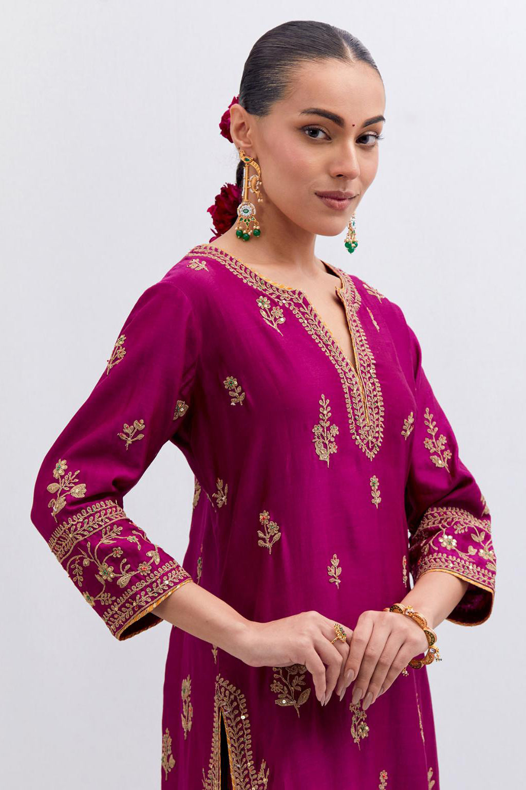 Fuchsia Silk Chanderi straight kurta set with dull gold dori embroidery at front & back neck, sleeves, side slits and hem, highlighted with gold sequins and bead work.
