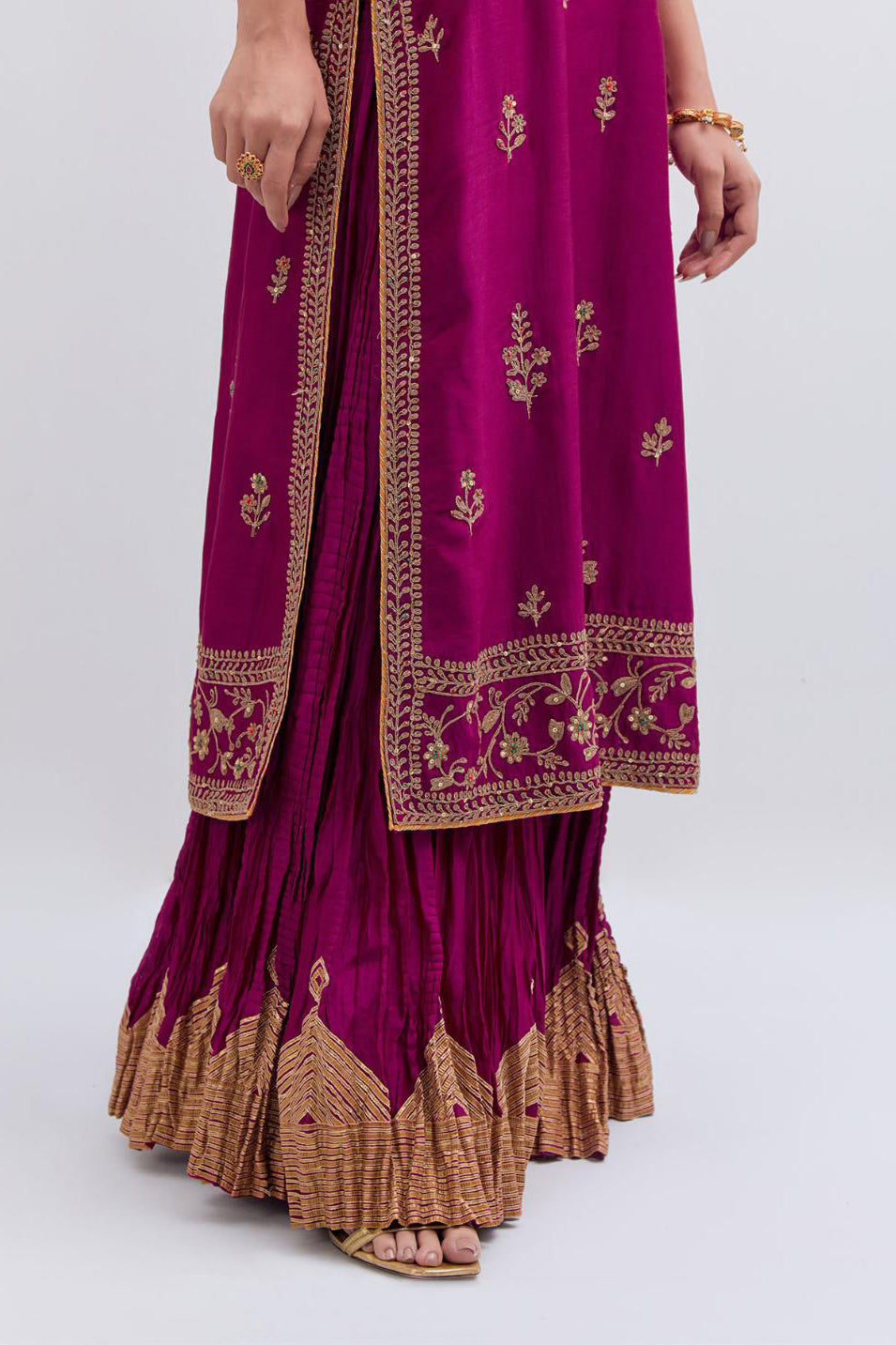 Fuchsia Silk Chanderi straight kurta set with dull gold dori embroidery at front & back neck, sleeves, side slits and hem, highlighted with gold sequins and bead work.