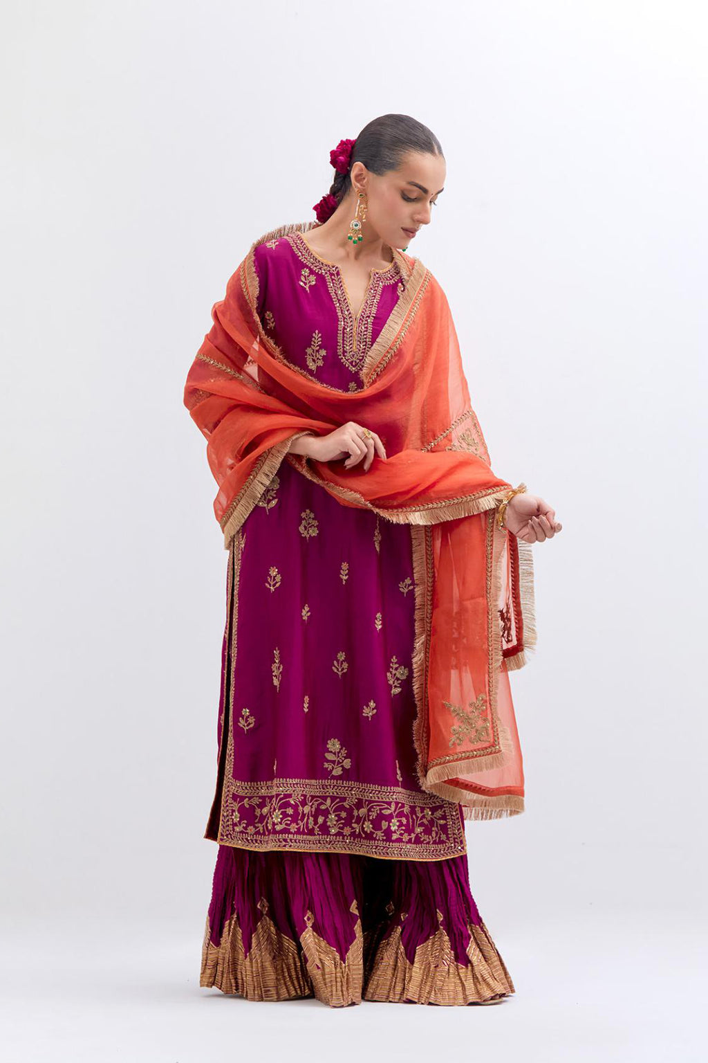Fuchsia Silk Chanderi straight kurta set with dull gold dori embroidery at front & back neck, sleeves, side slits and hem, highlighted with gold sequins and bead work.