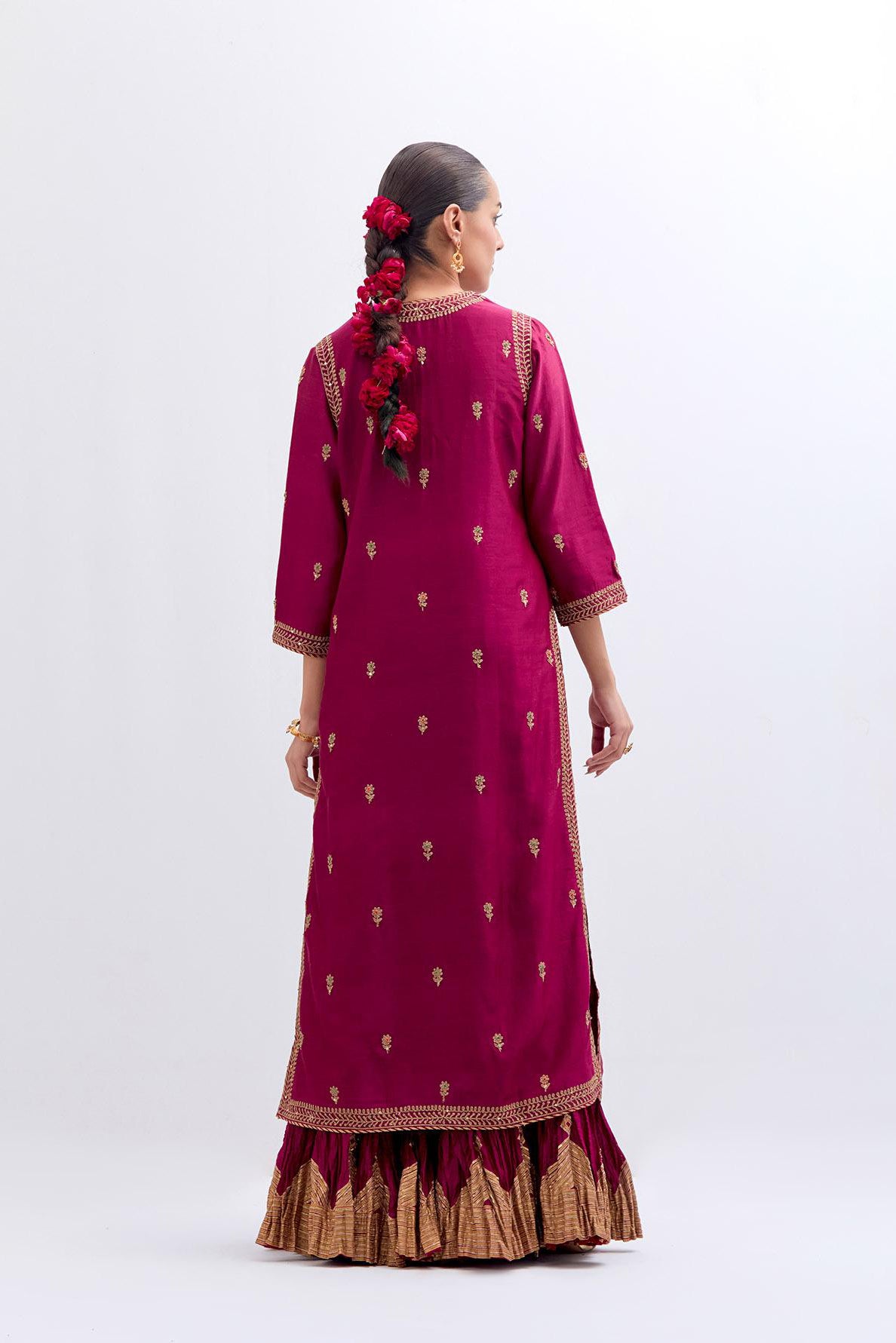 Fuchsia Silk Chanderi straight kurta set with narrow border dull gold dori embroidery at front & back neck, sleeves, side slits and hem, highlighted with gold sequins and bead work.