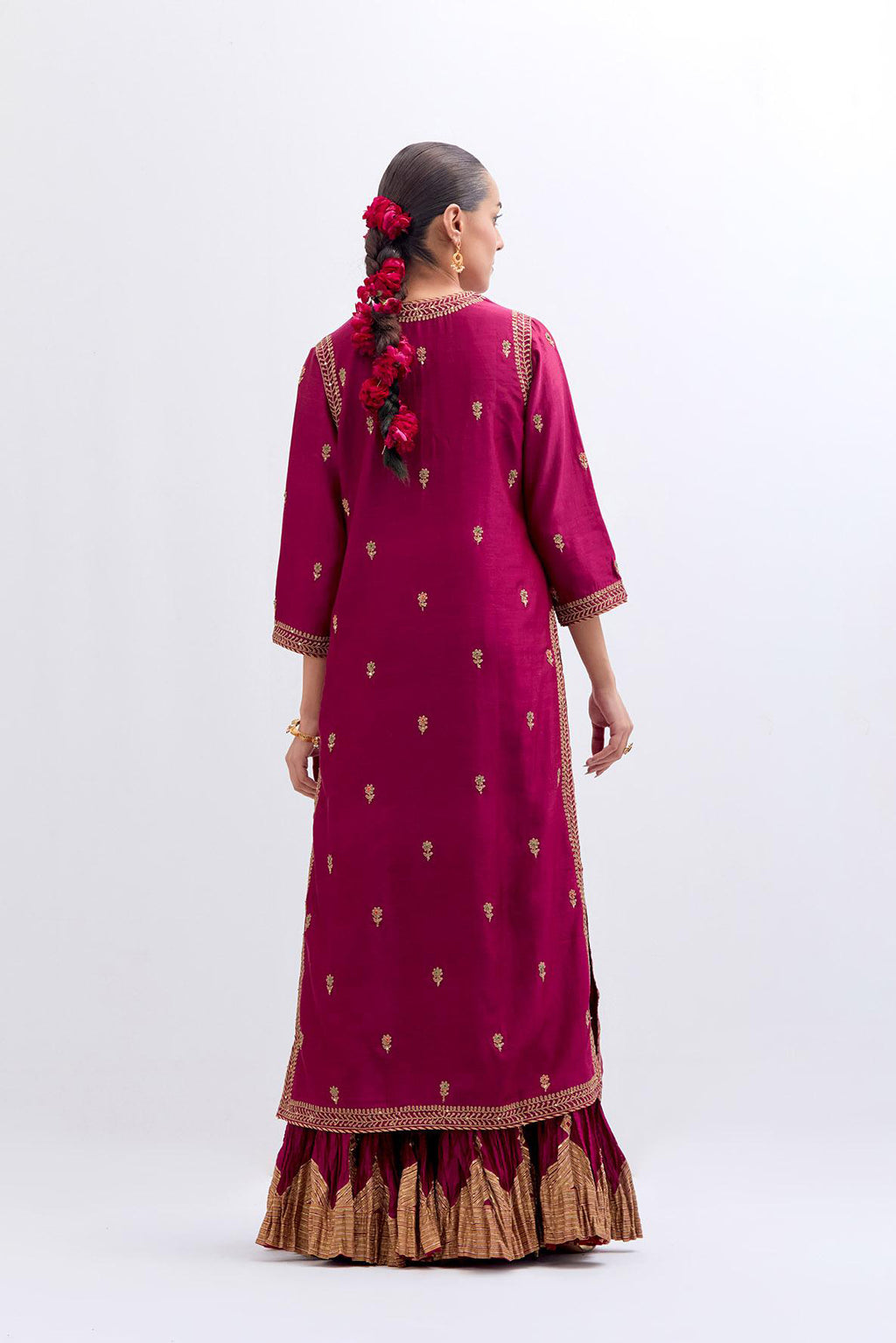 Fuchsia Silk Chanderi straight kurta set with narrow border dull gold dori embroidery at front & back neck, sleeves, side slits and hem, highlighted with gold sequins and bead work.