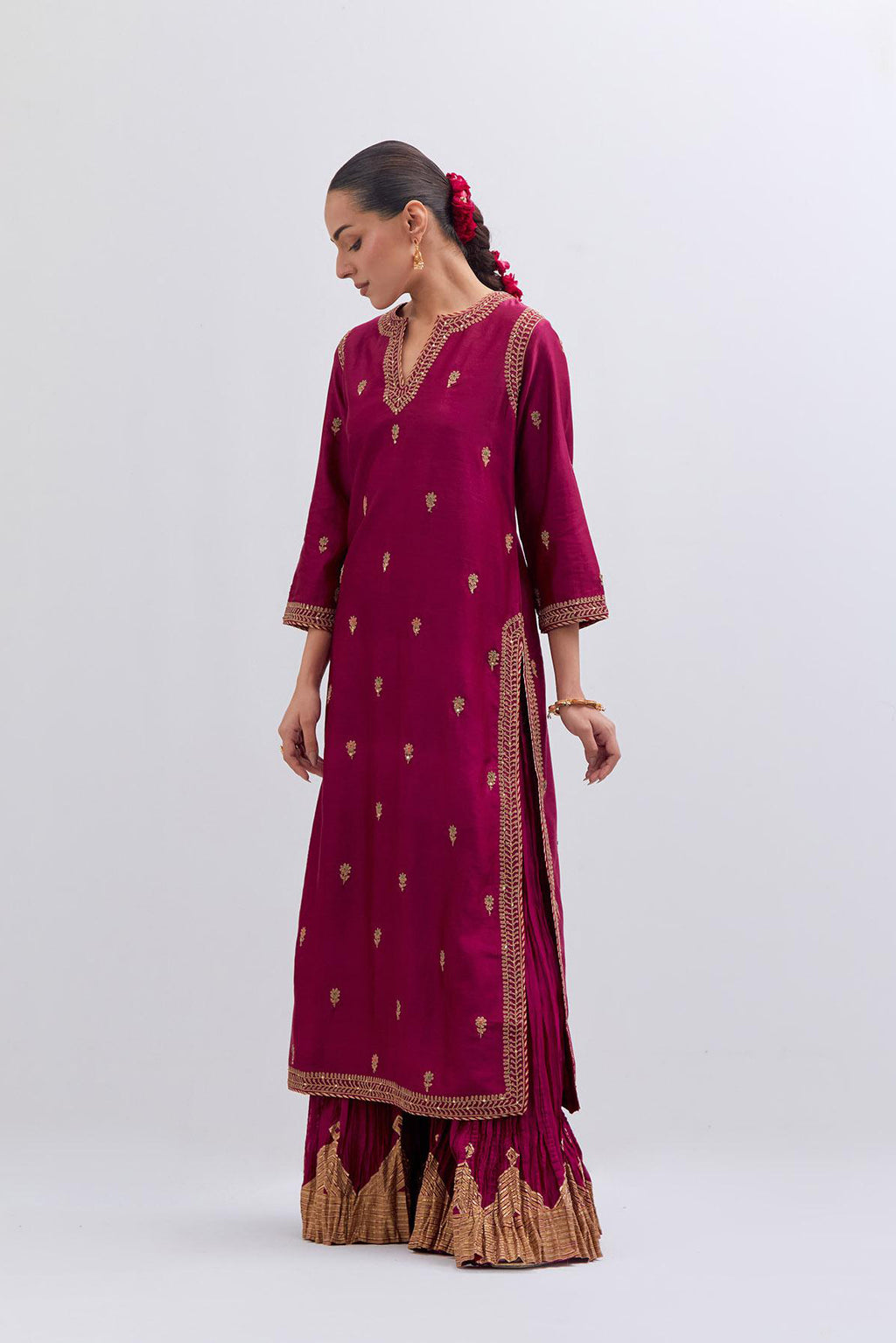 Fuchsia Silk Chanderi straight kurta set with narrow border dull gold dori embroidery at front & back neck, sleeves, side slits and hem, highlighted with gold sequins and bead work.