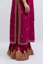 Fuchsia Silk Chanderi straight kurta set with narrow border dull gold dori embroidery at front & back neck, sleeves, side slits and hem, highlighted with gold sequins and bead work.