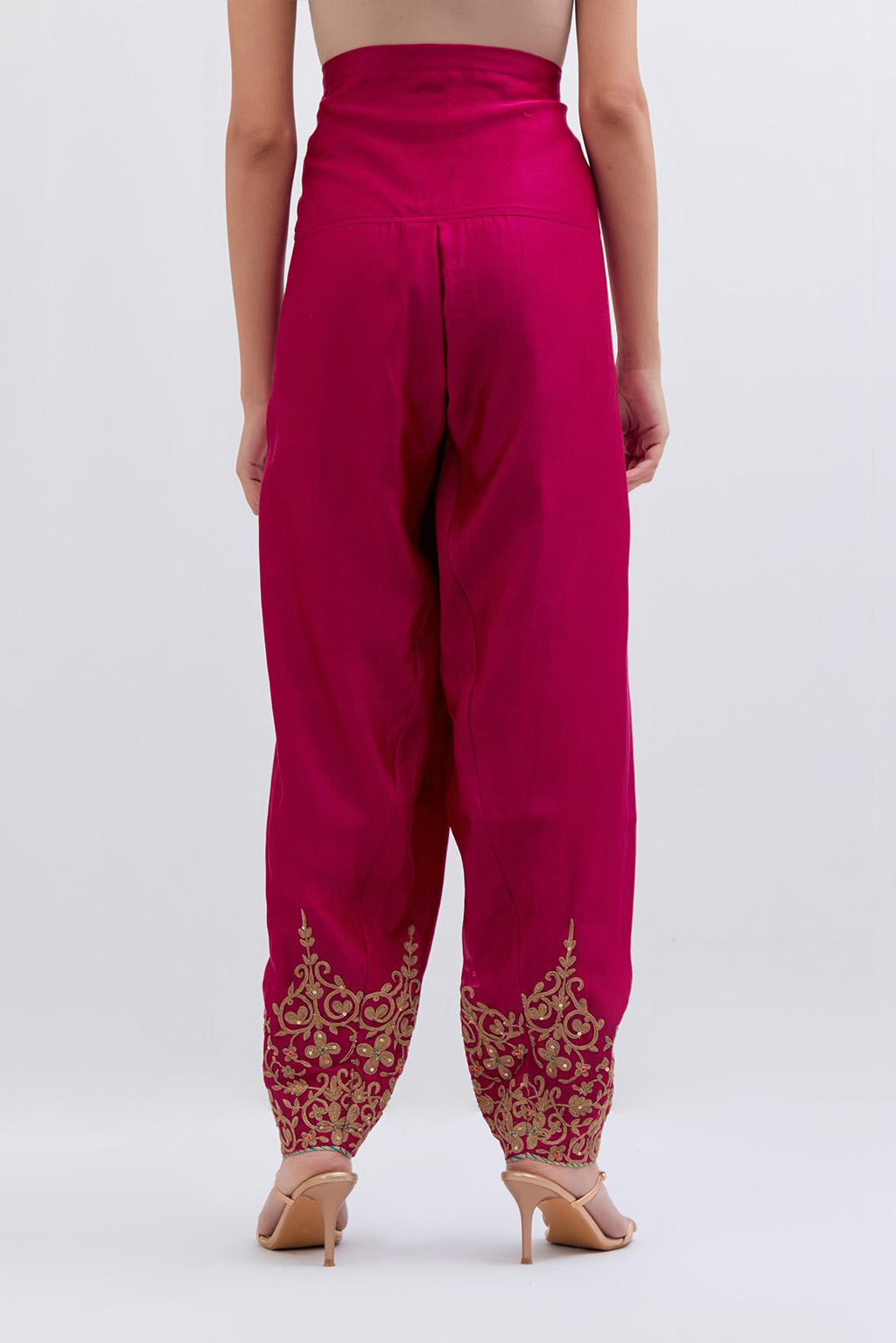 Fuchsia Silk Chanderi narrow salwar with light gold dori embroidery at hem, highlighted with multi colored beads and gold sequins work.