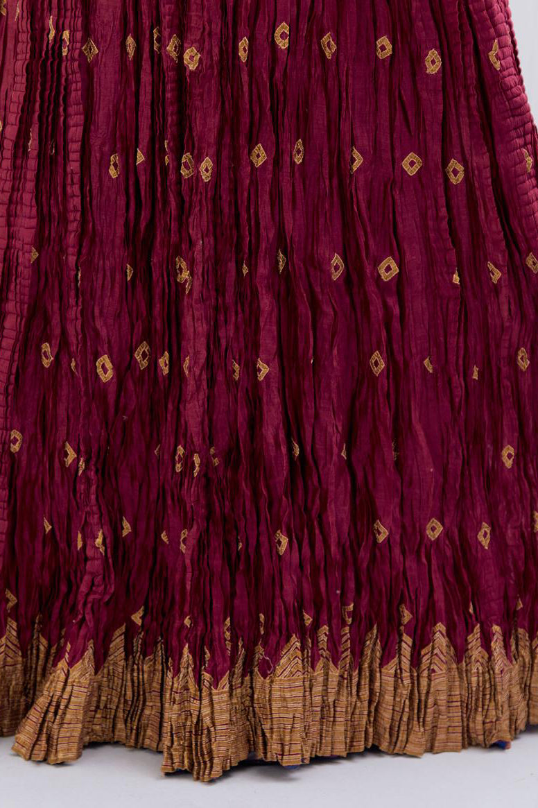 Chanderi 40 kali lehenga edged with dull gold gota embroidery and contrast chanderi facings.