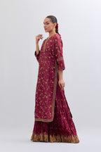 Red Silk chanderi straight kurta set with all-over dull gold dori jaal embroidery, highlighted with gold sequins and bead work.