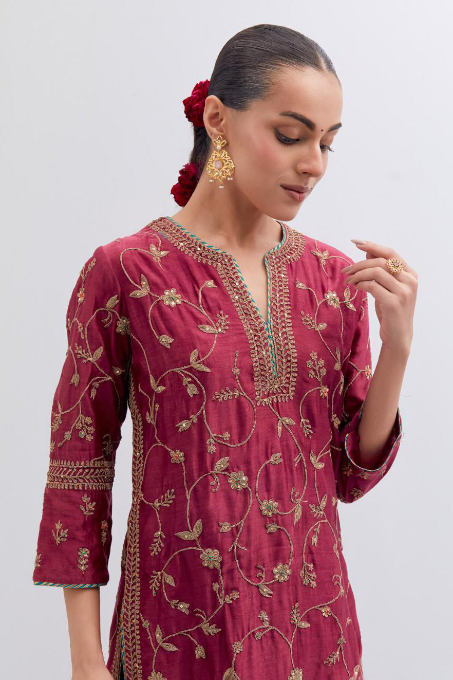 Red Silk chanderi straight kurta set with all-over dull gold dori jaal embroidery, highlighted with gold sequins and bead work.